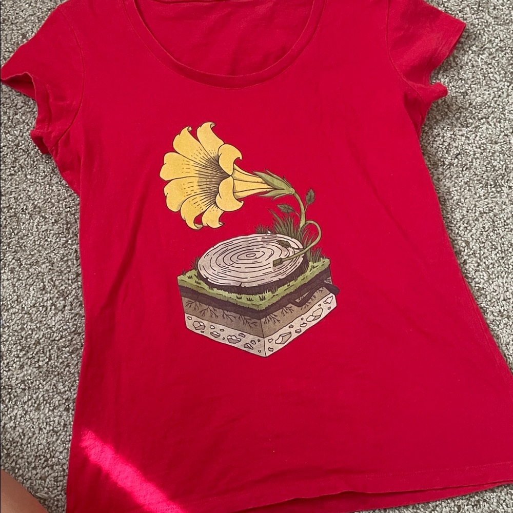 Red Graphic T-Shirt with Yellow Flower Design. Off the shoulder